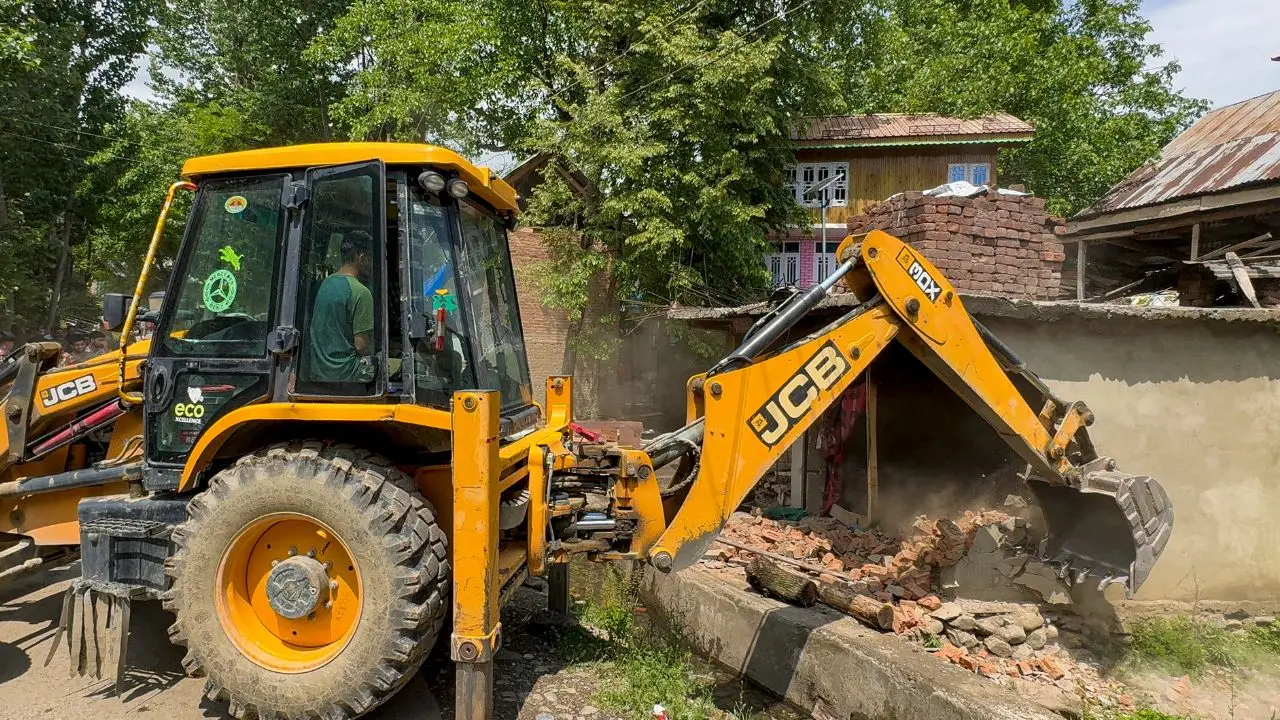 Demolition carried out by J&K revenue department in Anantnag. Pic/PTI